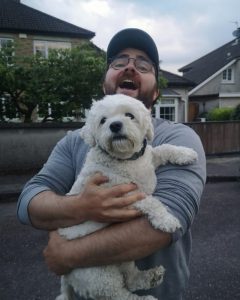 Joe the dog-walker from joes happy tails with LuLu on a dog walk in Cork